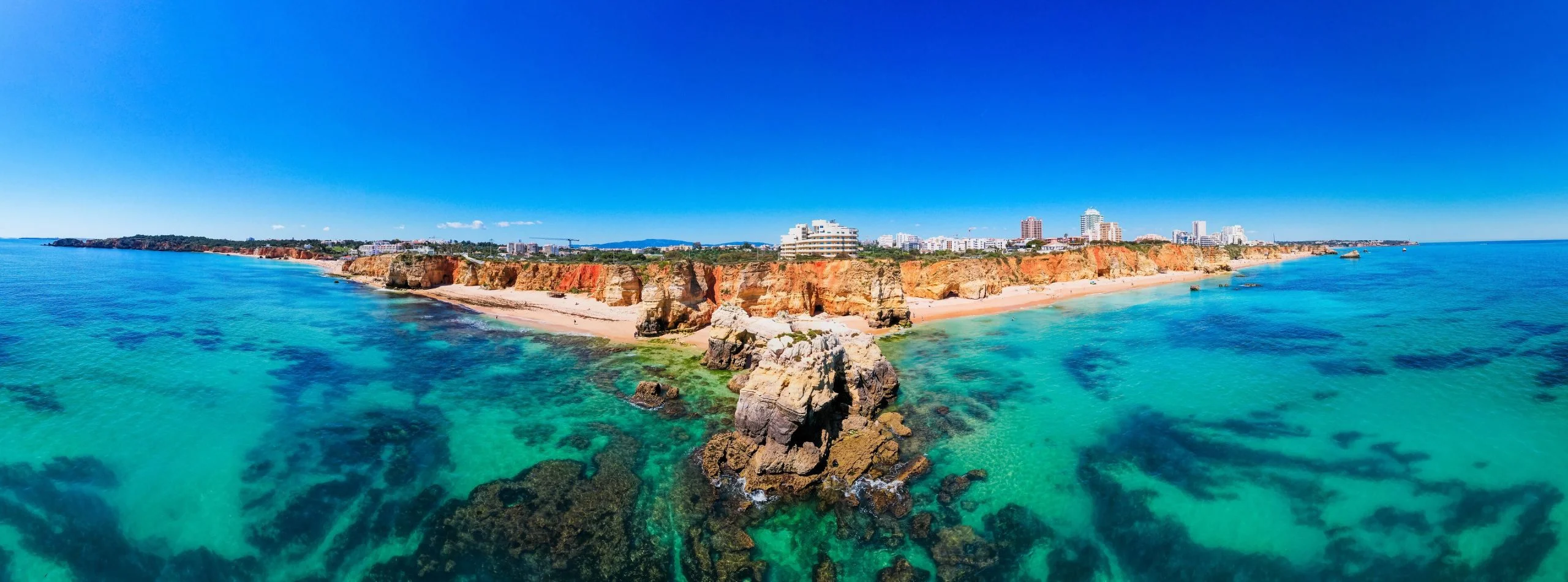 Praia da Rocha beach in Portimao with golden cliffs