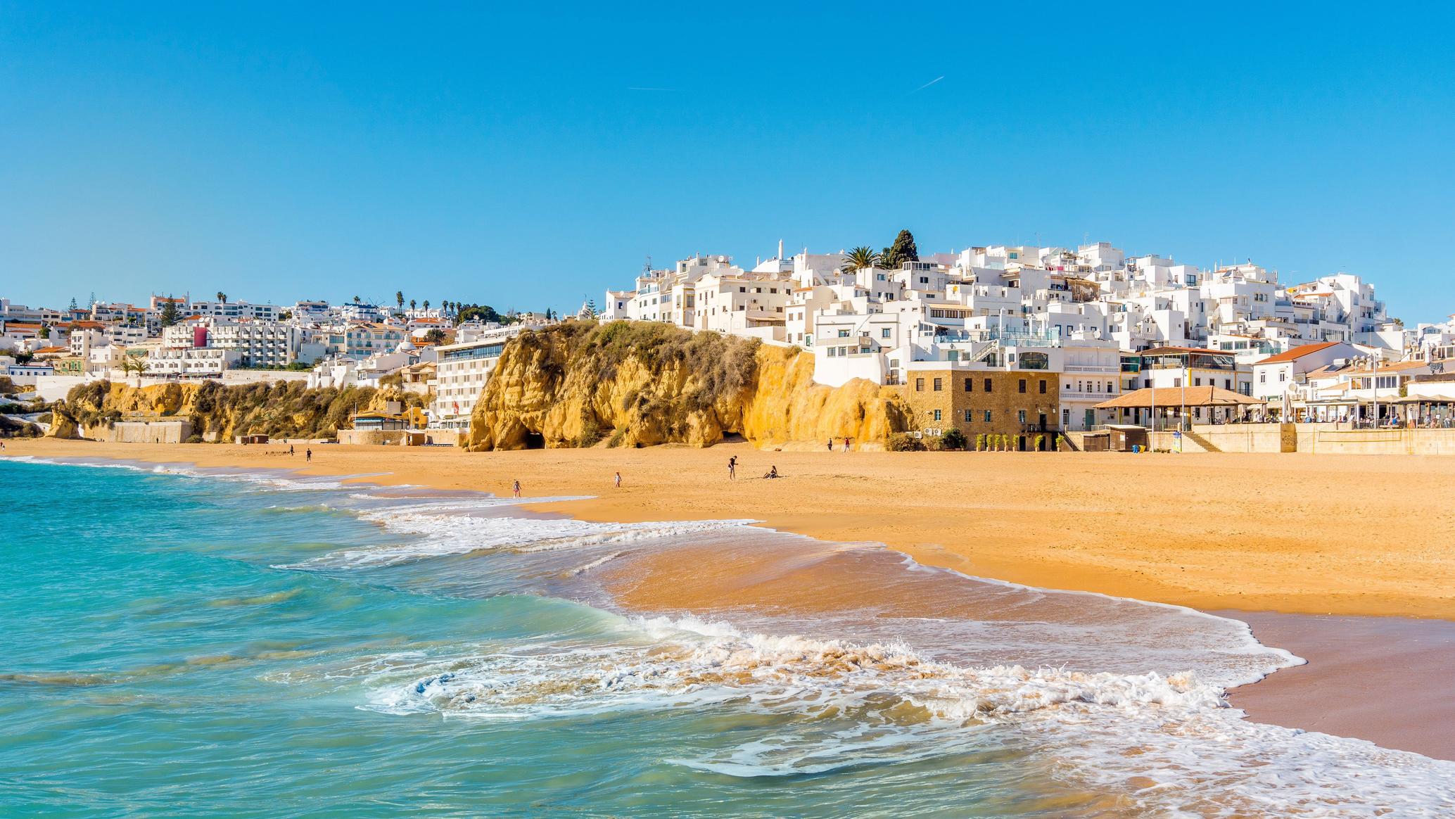 Panoramic view of Faro's coastline, with the historic city centre and the Ria Formosa Natural Park.